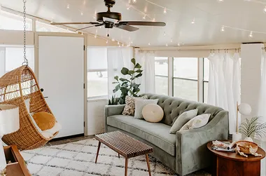 sunroom with hanging chair
